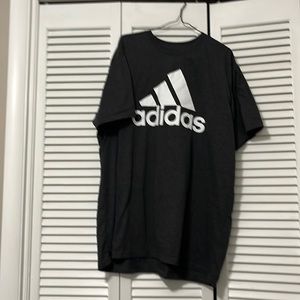 Trending Adidas golf shirt never been worn. $